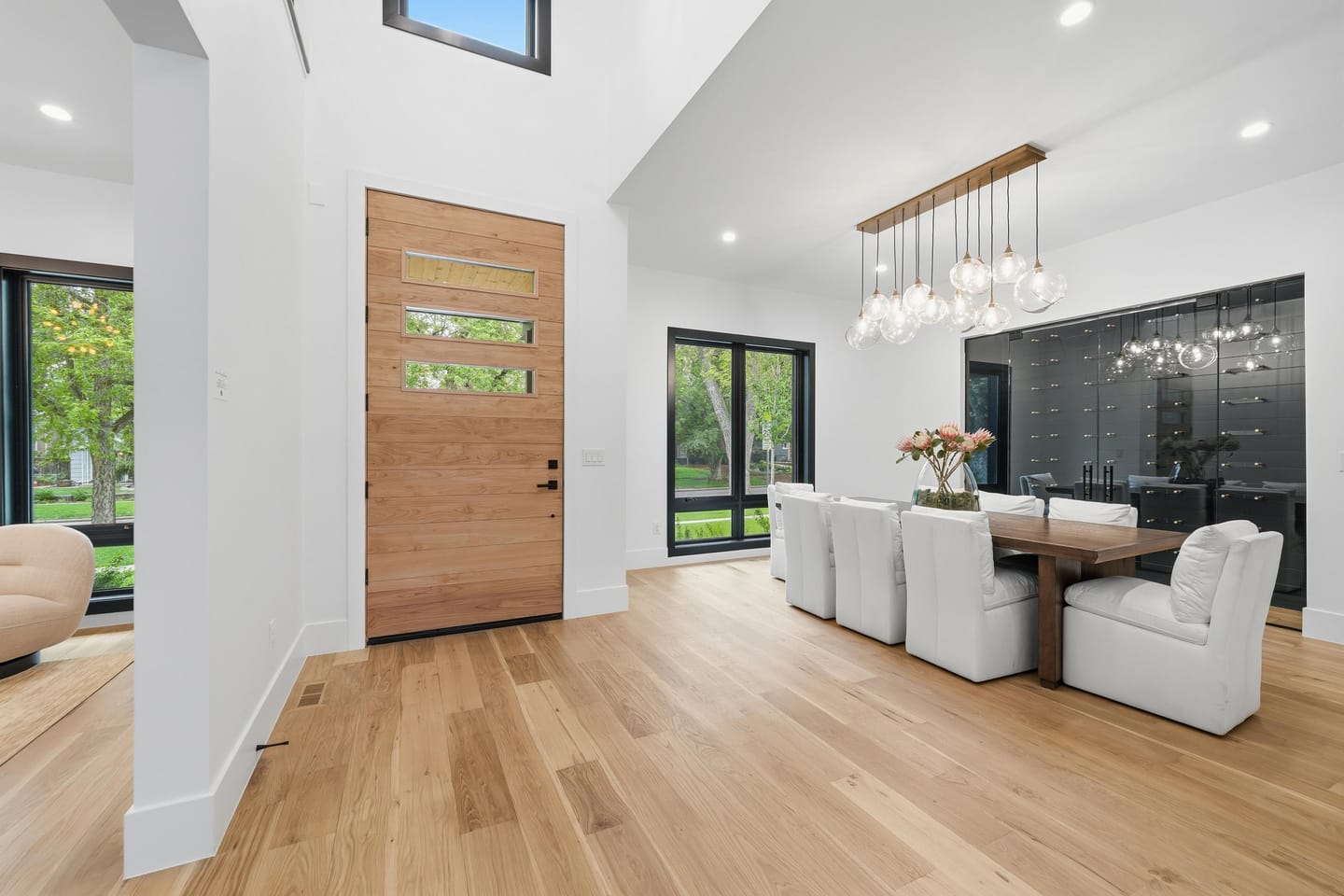 Entry hall with white oak flooring at 2442 Saint Paul
