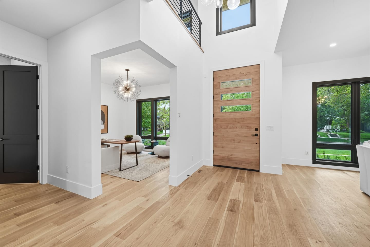 Entry hall with white oak flooring at 2442 Saint Paul