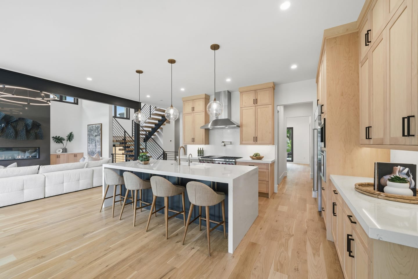 Butler's pantry with quartz counter and brass fixtures