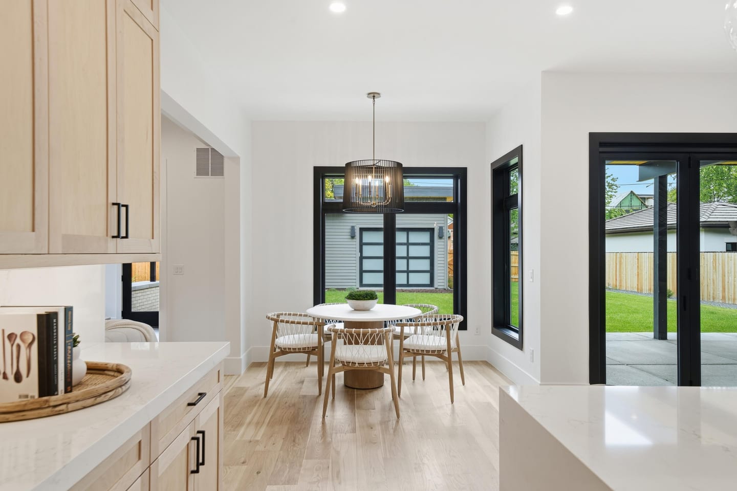 Hearth room with tile-surround fireplace off the kitchen