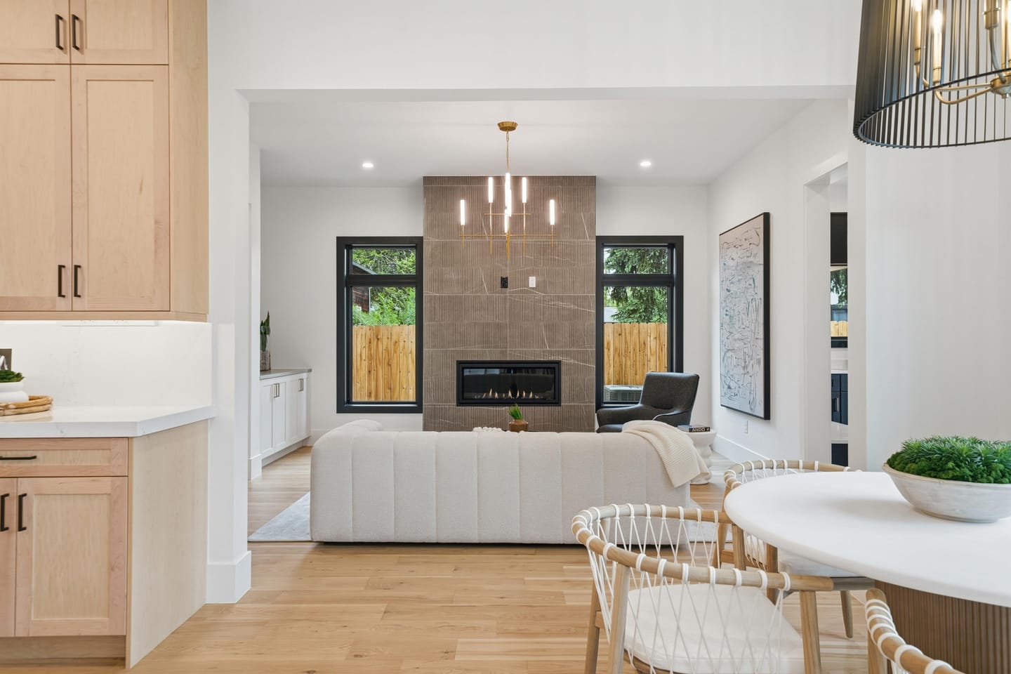 Hearth room with tile-surround fireplace off the kitchen