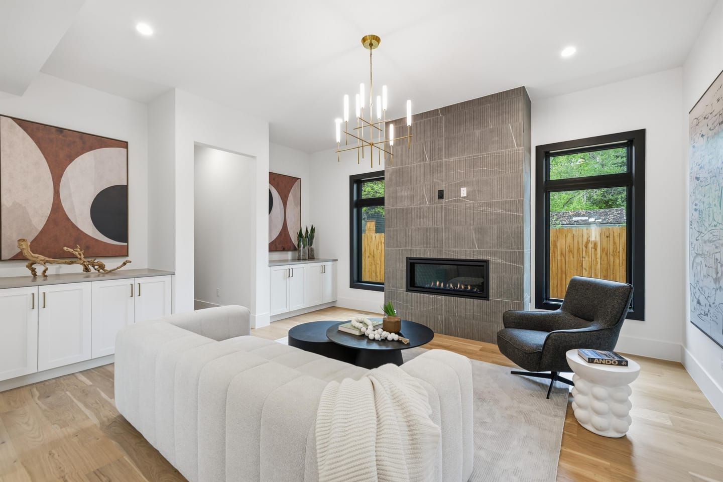 Hearth room with tile-surround fireplace off the kitchen