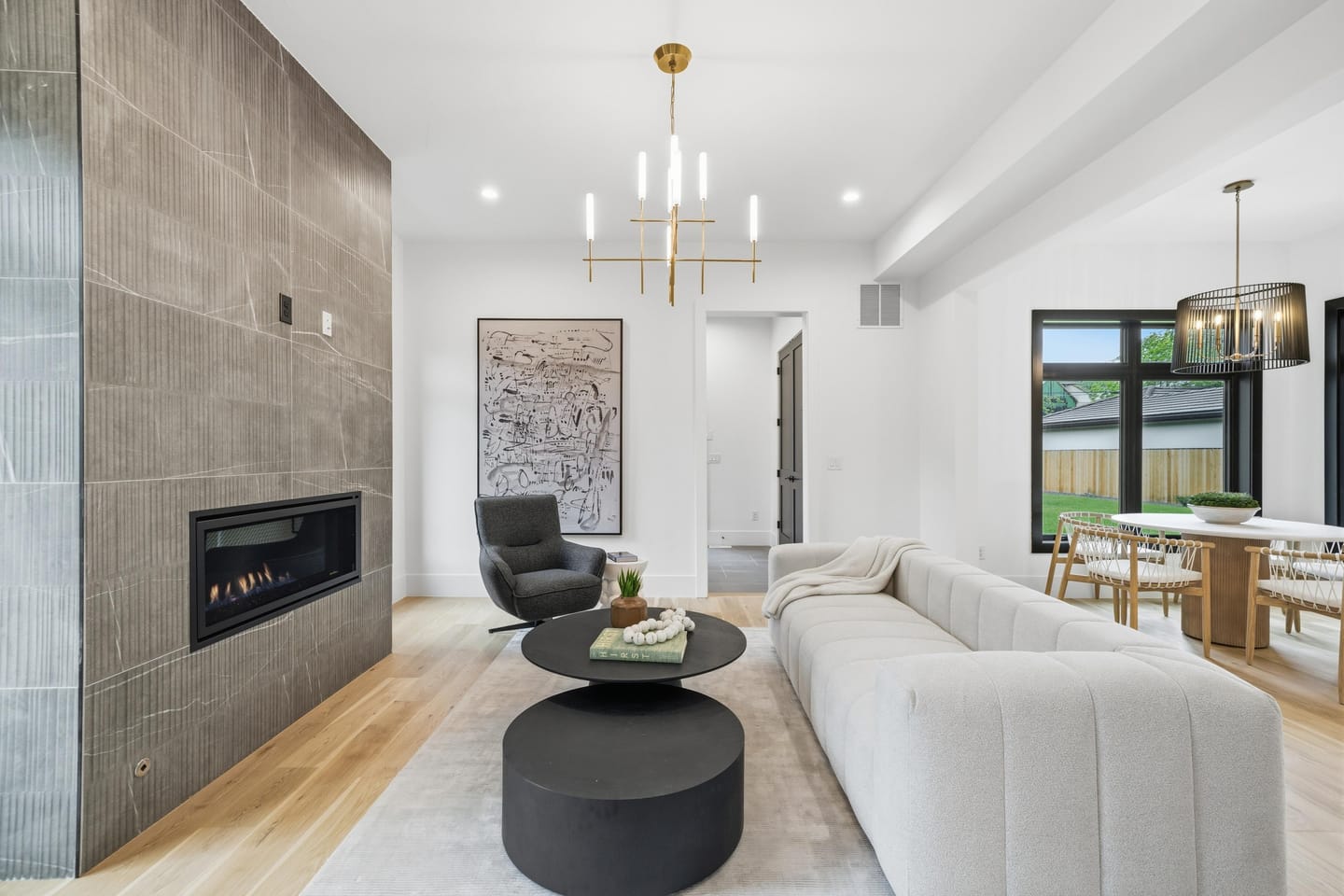 Hearth room with tile-surround fireplace off the kitchen