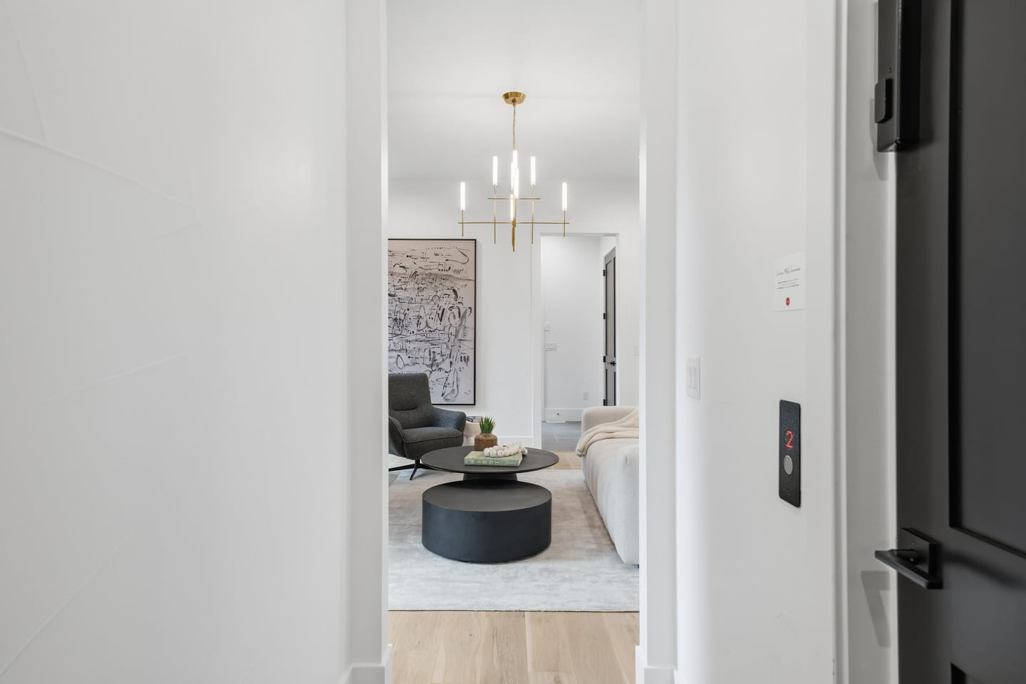 Private elevator with dark slat surround serving all levels