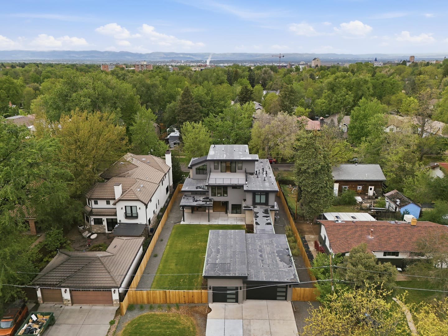 Overhead view of the street-to-street double lot, residence, breezeway and garage