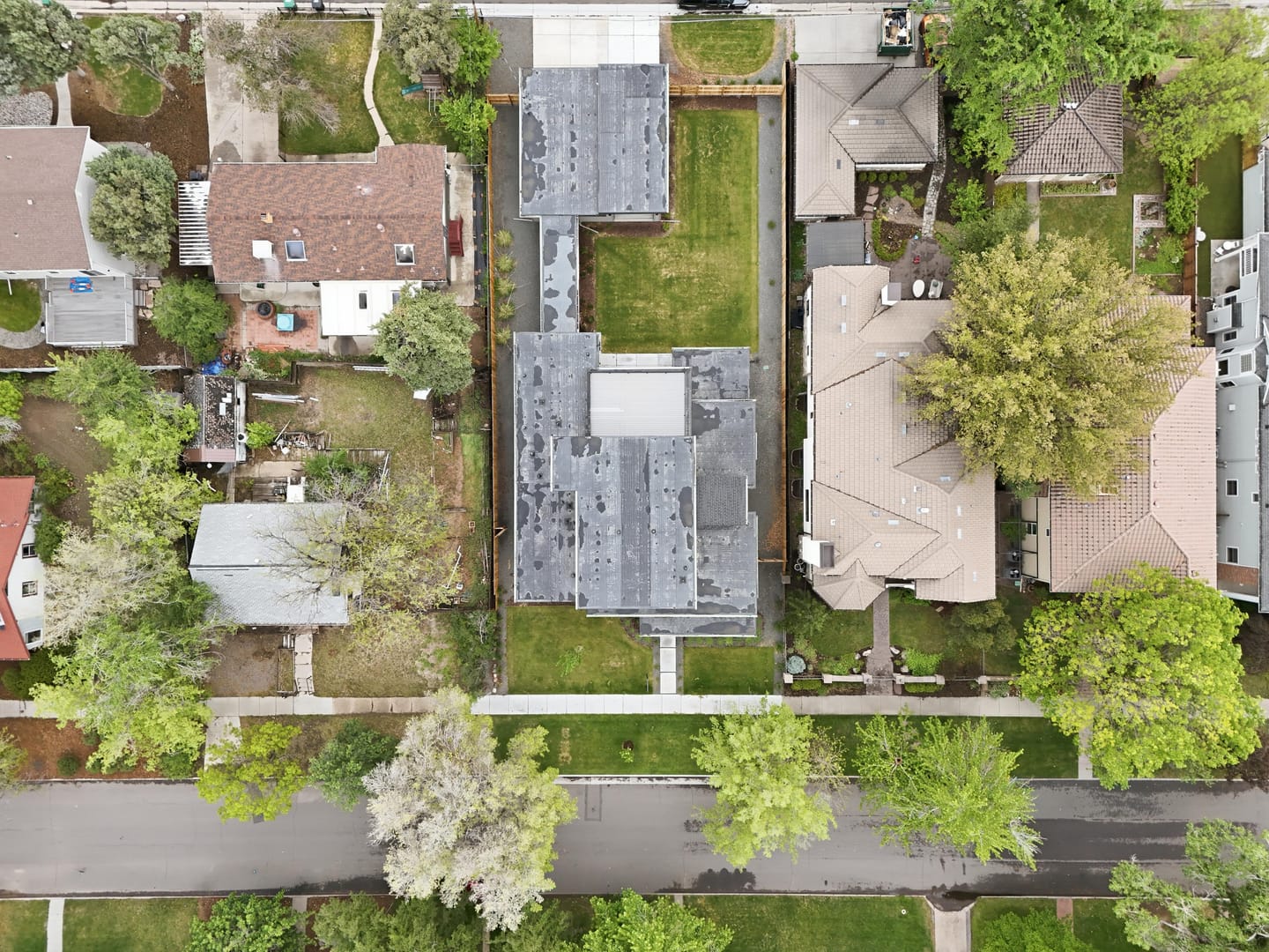 Overhead view of the street-to-street double lot, residence, breezeway and garage