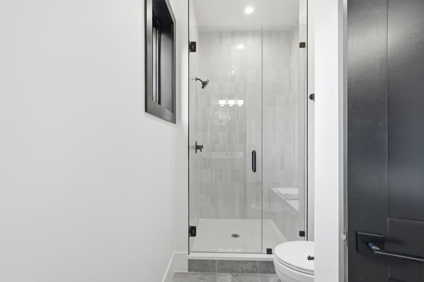 Bathroom with glass shower enclosure