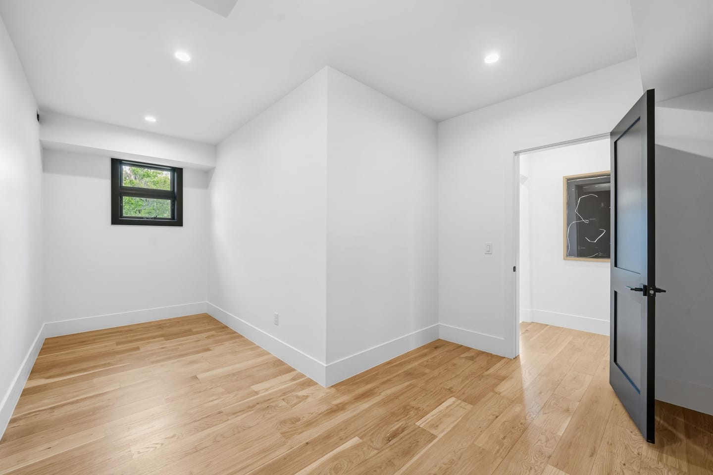 Lower-level bedroom with egress window